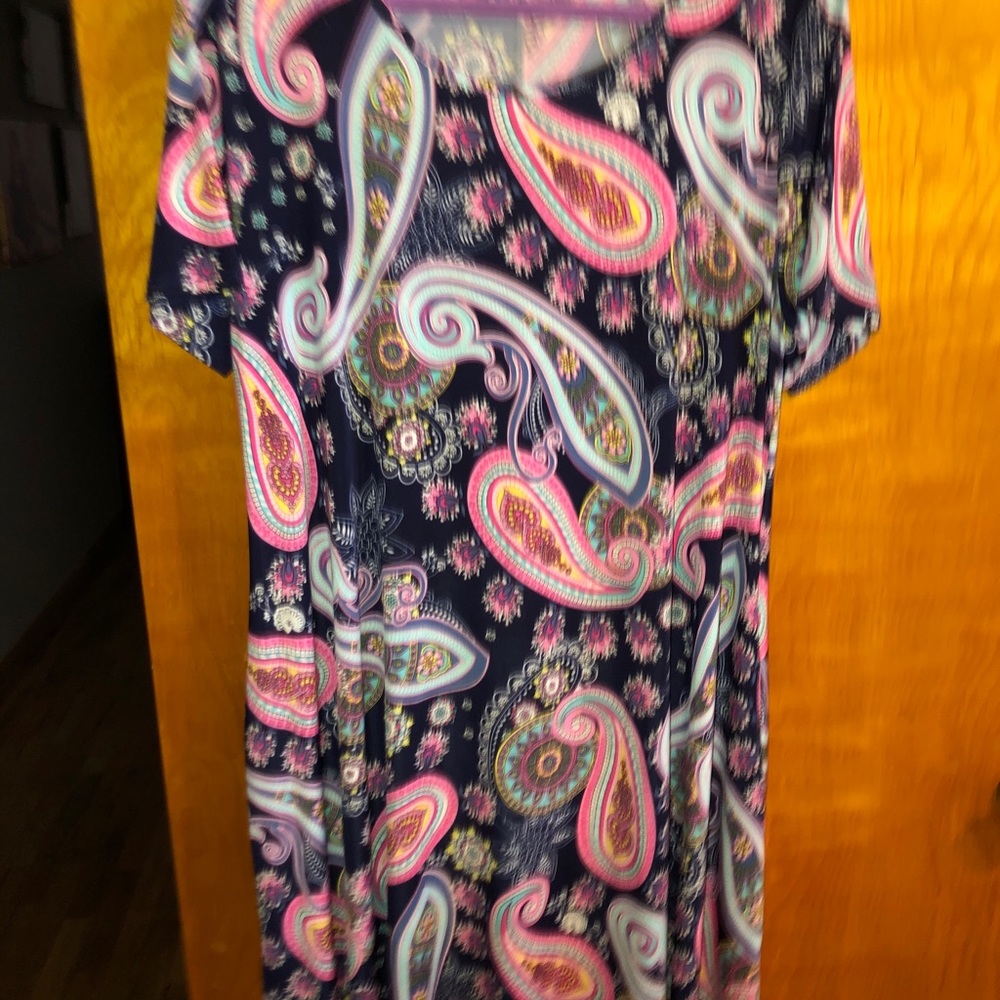 Tunic dress with leggings.